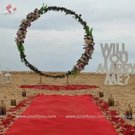 the-beach-proposal-with-oval-backdrop