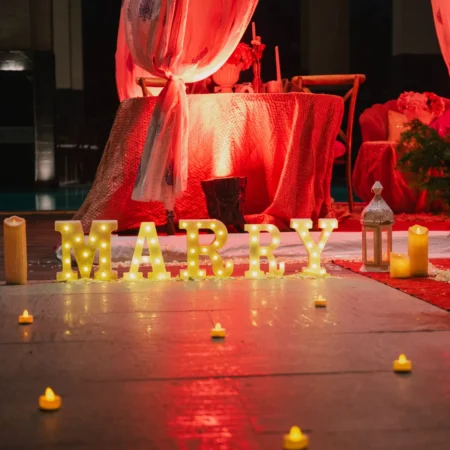 heart-backdrop-luxury-proposal-at-taj-vivanta